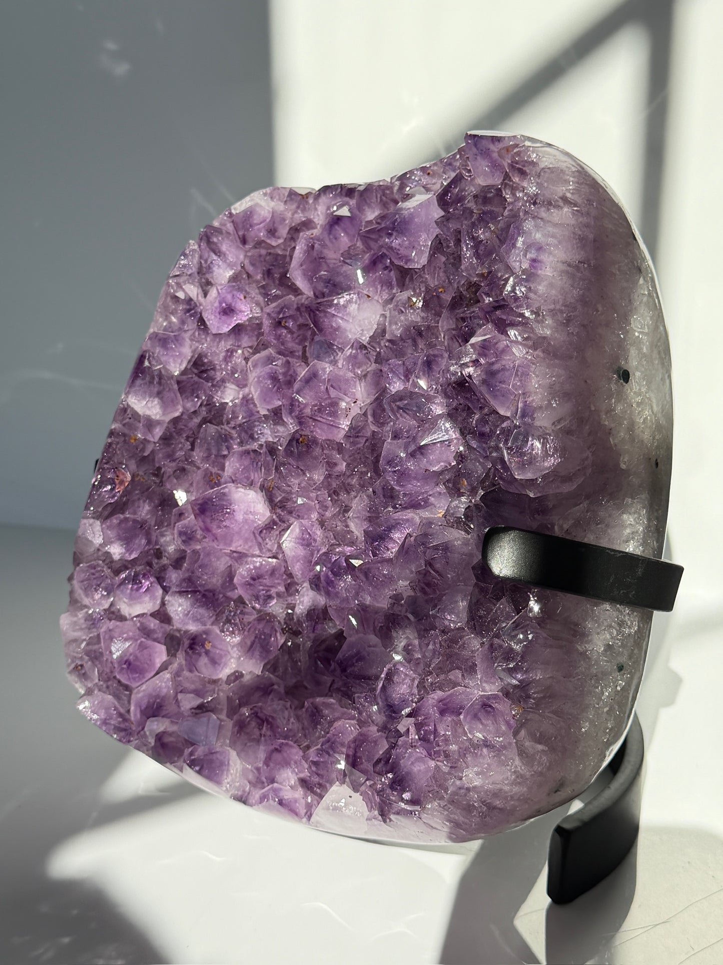 Expertly Polished Amethyst with Geothite Statement on Stand