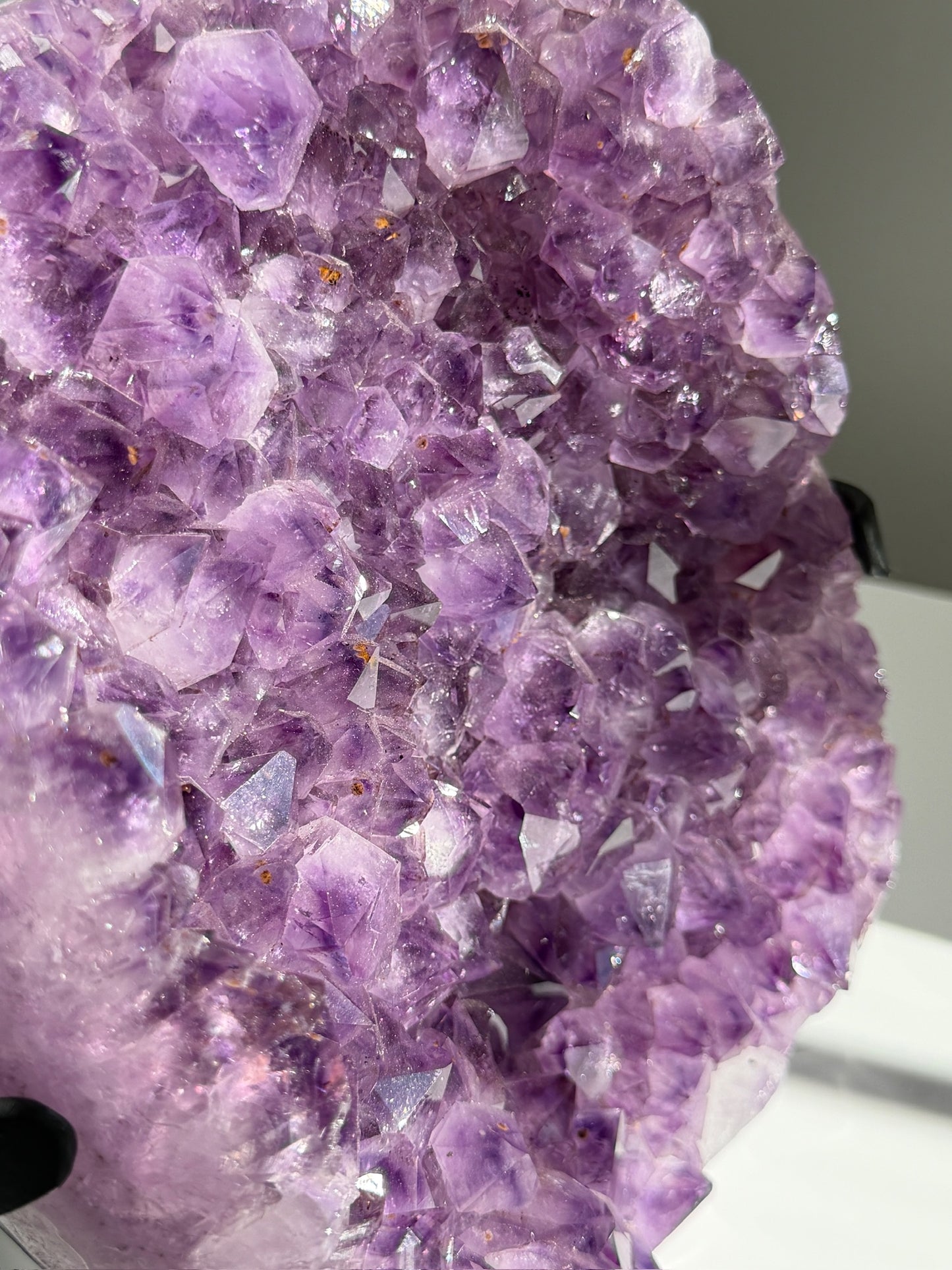 Expertly Polished Amethyst with Geothite Statement on Stand
