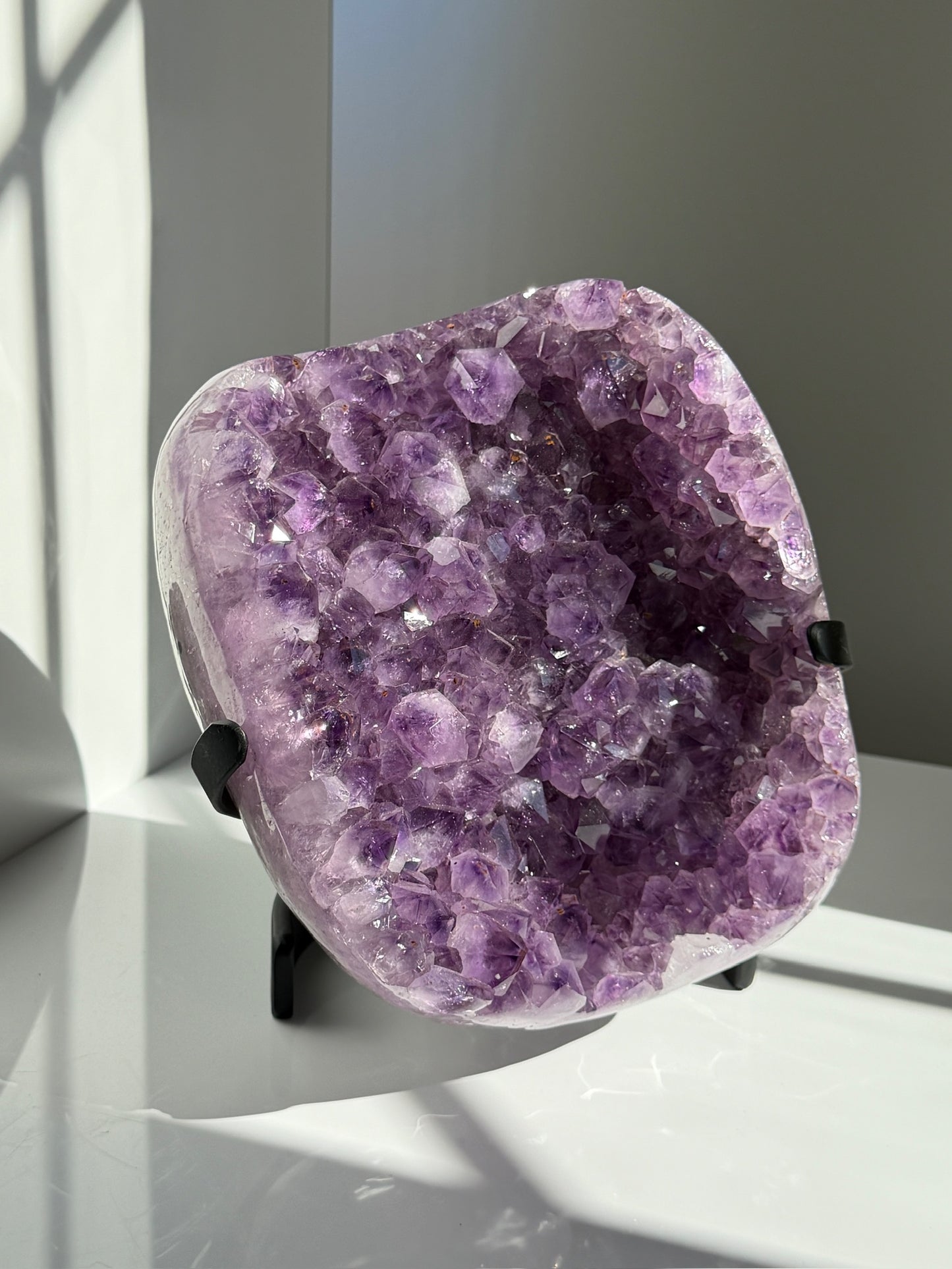 Expertly Polished Amethyst with Geothite Statement on Stand