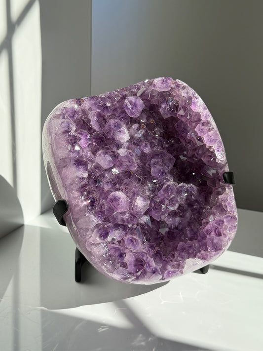Expertly Polished Amethyst with Geothite Statement on Stand