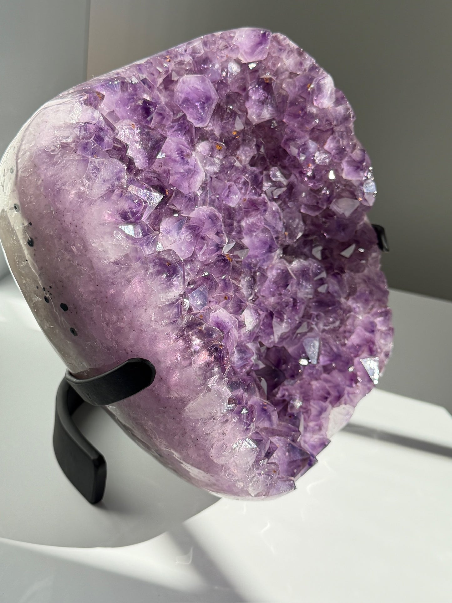 Expertly Polished Amethyst with Geothite Statement on Stand